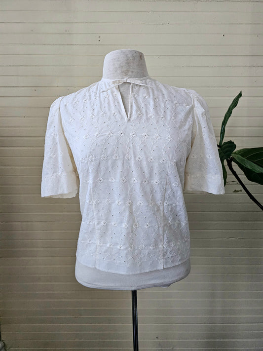 Vintage blouse handmade white eyelet lace floral pattern short sleeves back buttons keyhole neck bow tie theatre costume cotton cottagecore 40s 50s