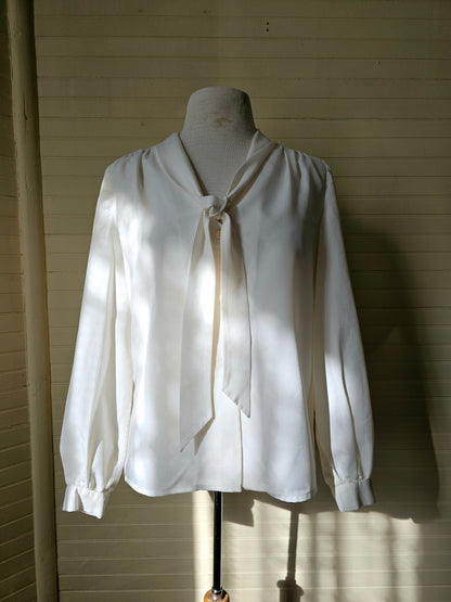 Vintage blouse handmade cream long sleeve v neck pussy bow tie button up front puff sleeves cuffed 70s polyester feminine ladylike dressy casual flowy romantic