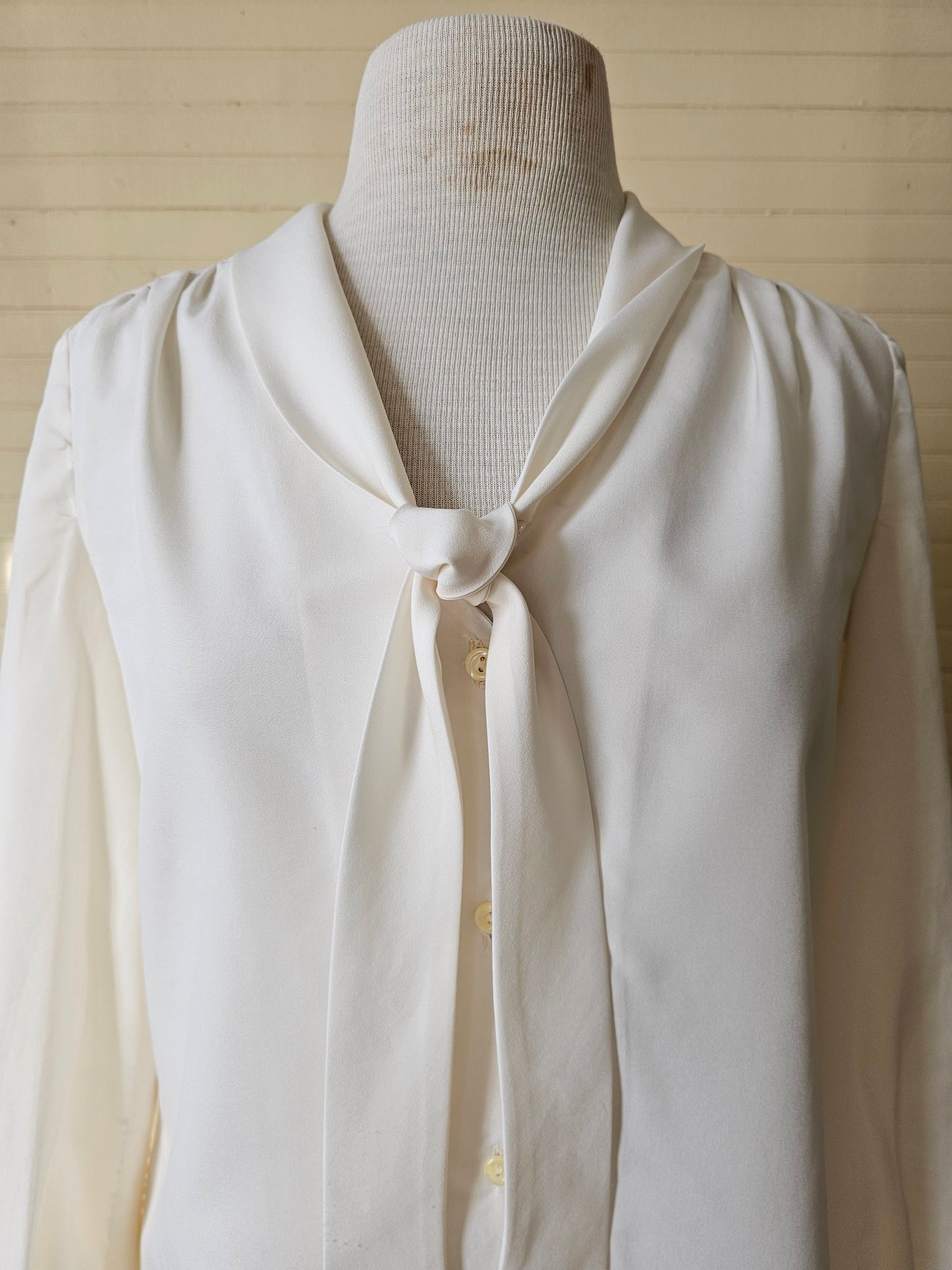 Vintage blouse handmade cream long sleeve v neck pussy bow tie button up front puff sleeves cuffed 70s polyester feminine ladylike dressy casual flowy romantic