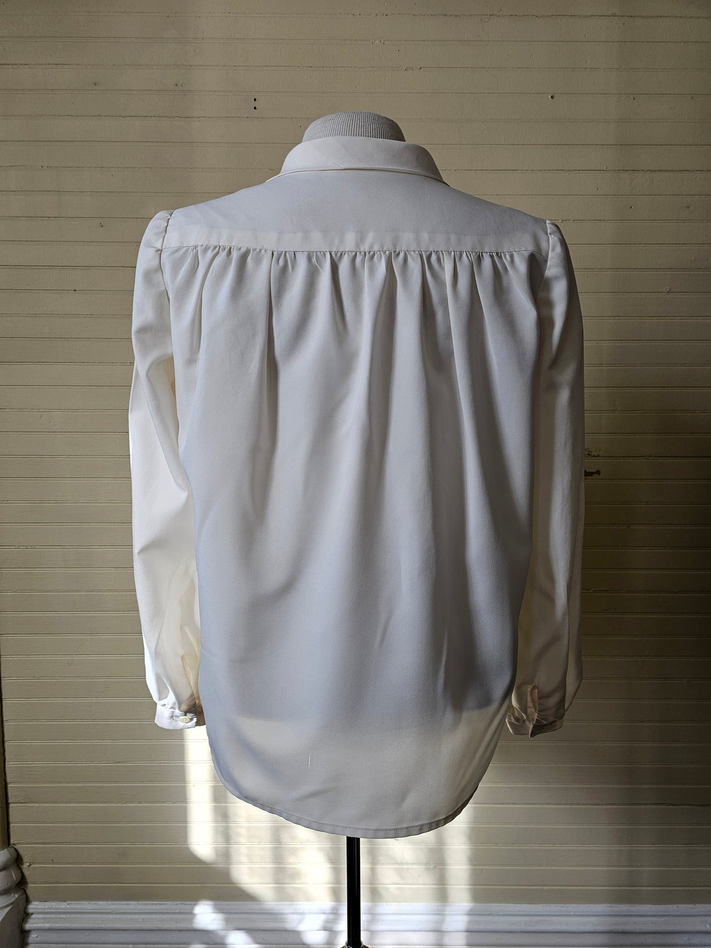 Vintage blouse handmade cream long sleeve v neck pussy bow tie button up front puff sleeves cuffed 70s polyester feminine ladylike dressy casual flowy romantic