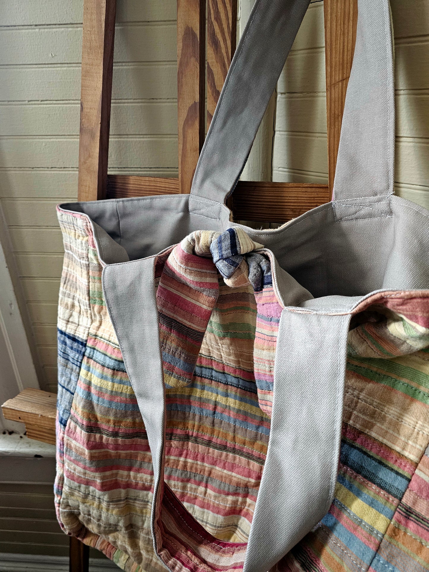 Handmade quilt bag, tote carryall large oversized upcycled repurposed lined pocket stripes rainbow colorful tie closure
