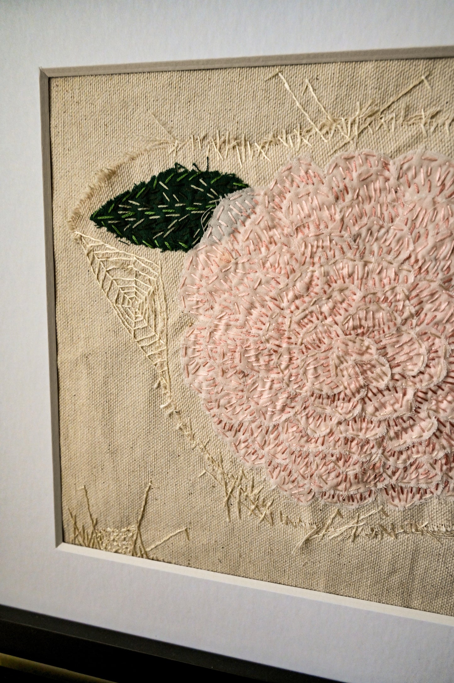 Camellia, original art hand embroidered raw edge applique upcycled fabrics textile art