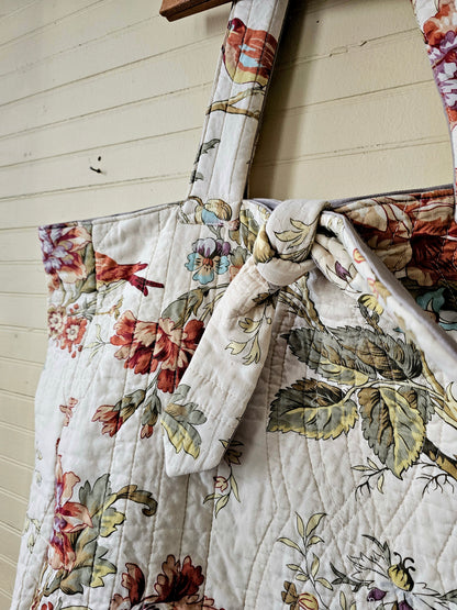 Handmade quilt tote, upcycled repurposed large oversized coverlet floral paisley nature bird red brown earth tones tie closure inside pocket
