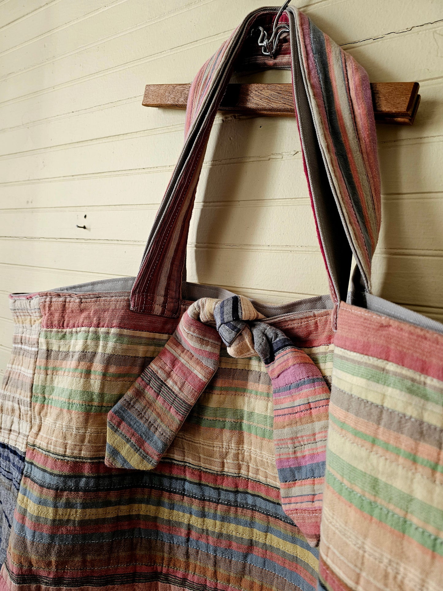 Handmade quilt bag, tote carryall large oversized upcycled repurposed lined pocket stripes rainbow colorful tie closure