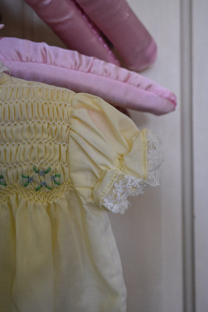 Vintage baby dress, Polly Flanders 3 to 9 mos yellow lace smocked floral button back short sleeves