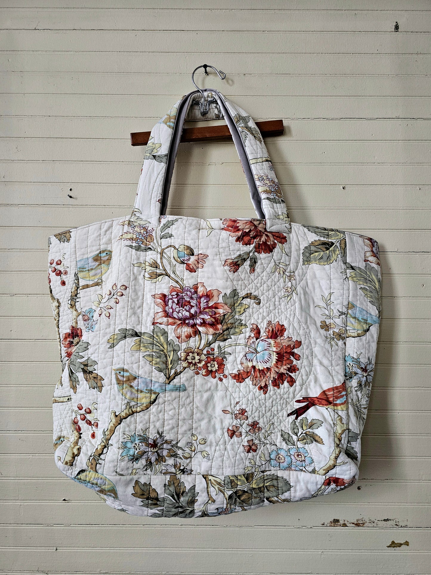 Handmade quilt tote, upcycled repurposed large oversized coverlet floral paisley nature bird red brown earth tones tie closure inside pocket
