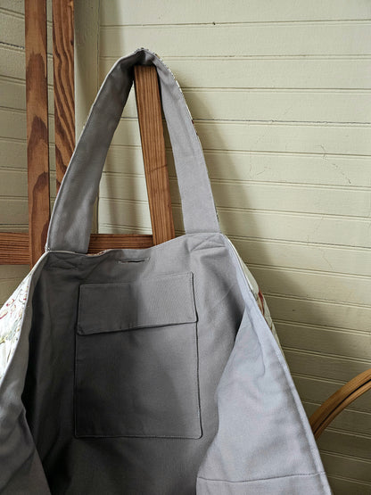 Handmade quilt tote, upcycled repurposed large oversized coverlet floral paisley nature bird red brown earth tones tie closure inside pocket