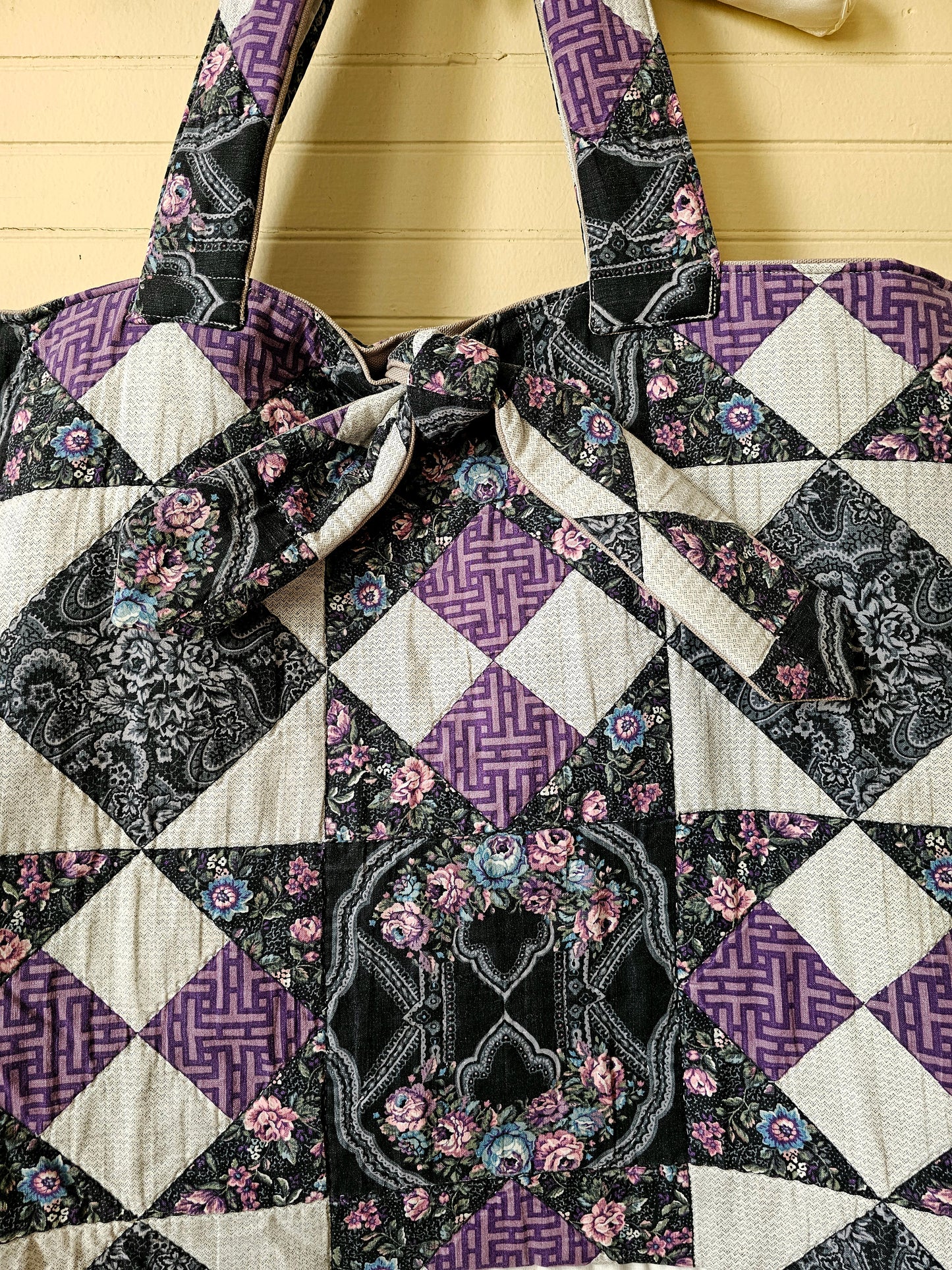 Handmade quilt bag, purple black patchwork repurposed refashioned upcycled large oversized carryall fully lined gray canvas tie closure inside pocket granny chic