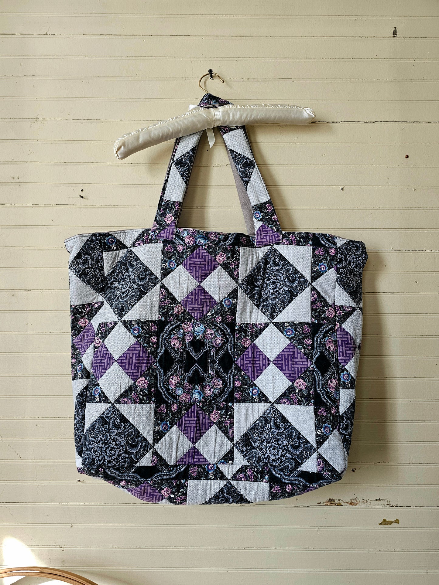 Handmade quilt bag, purple black patchwork repurposed refashioned upcycled large oversized carryall fully lined gray canvas tie closure inside pocket granny chic