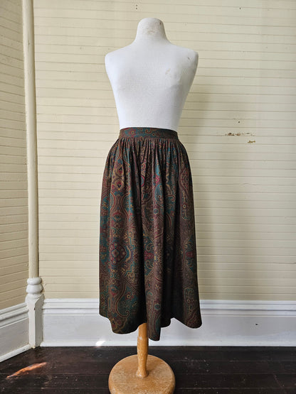 Vintage skirt, Preswick and Moore 8 paisley dark tones moody brown teal burgundy waistband button closure side pockets midi below knee flowy